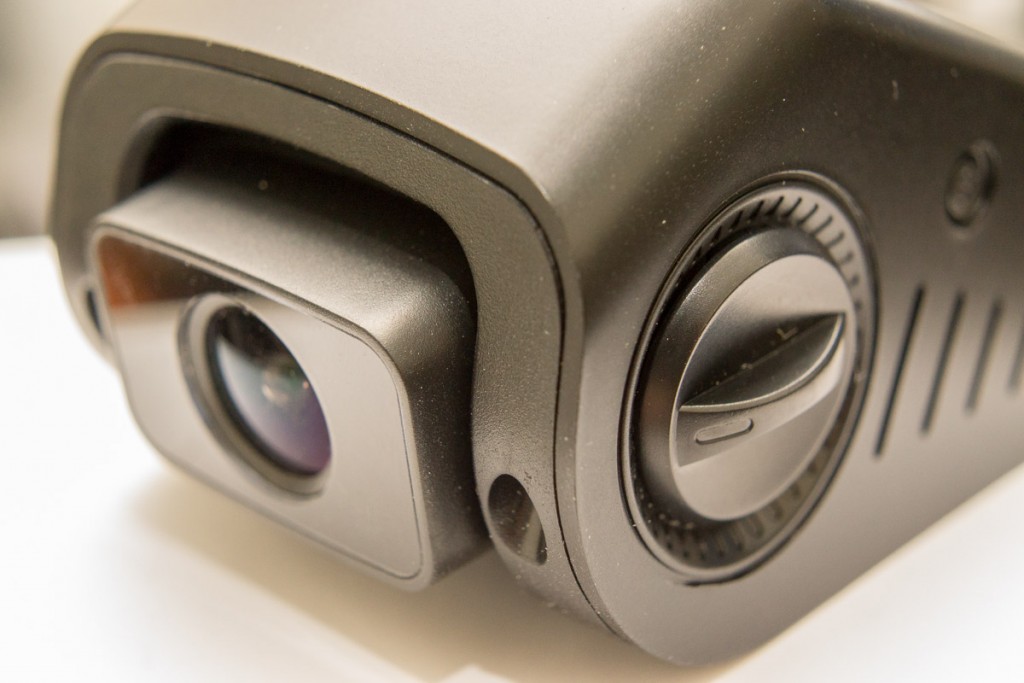 Controls knobs on either side of the camera can adjust the position of the lens.