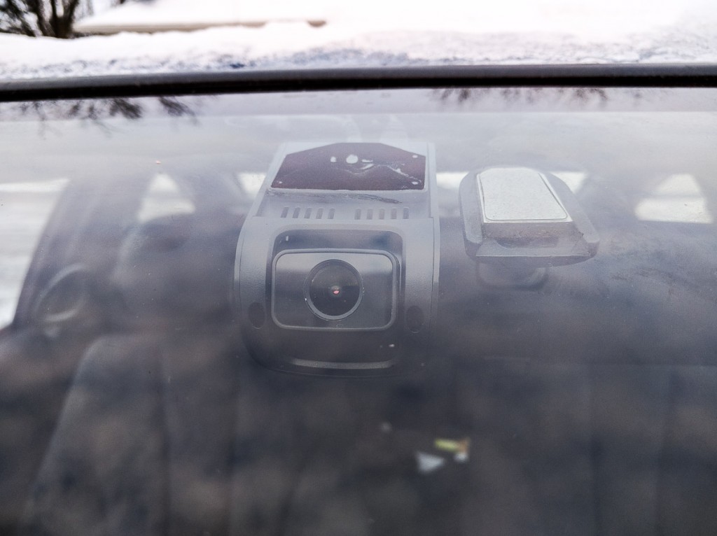 Once installed it tucks up neatly behind the rear-view mirror.